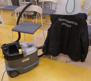 Bild på en textil- och möbeltvättsmaskin.