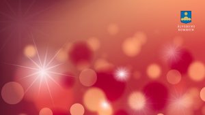 En röd bakgrund med guldiga cirklar.